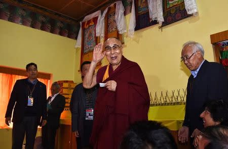 Tibetan spiritual leader Dalai Lama arrives to attend a press conference after delivering teachings at Yiga Choezin, in Tawang, in the northeastern state of Arunachal Pradesh, India April 8, 2017. REUTERS/Anuwar Hazarika