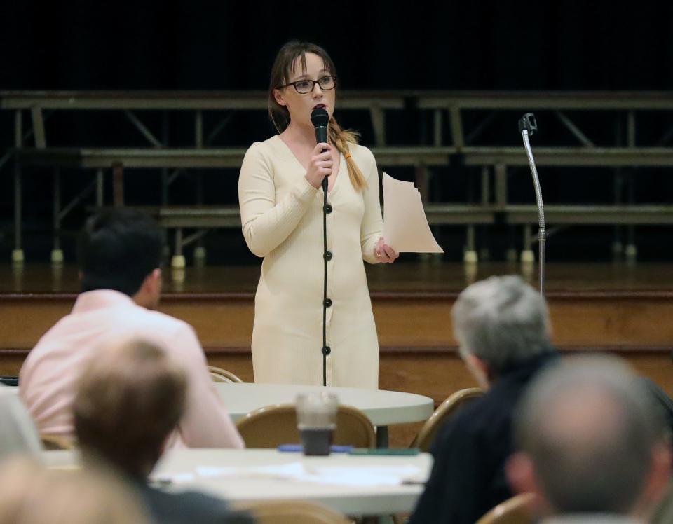 Meghan Lugo speaks about the wetlands off of White Pond Drive during a public engagement session at Zwisler Hall in Akron.