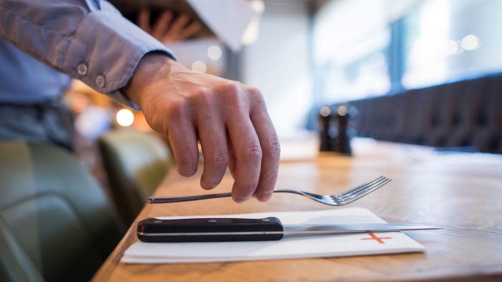 Worker in Whitbread restaurant