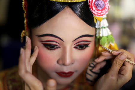 Dancers get ready backstage before a performance of masked theatre known as Khon which was recently listed by UNESCO, the United Nations' cultural agency, as an intangible cultural heritage, along with neighbouring Cambodia's version of the dance, known as Lakhon Khol at the Thailand Cultural Centre in Bangkok, Thailand November 7, 2018. REUTERS/Jorge Silva