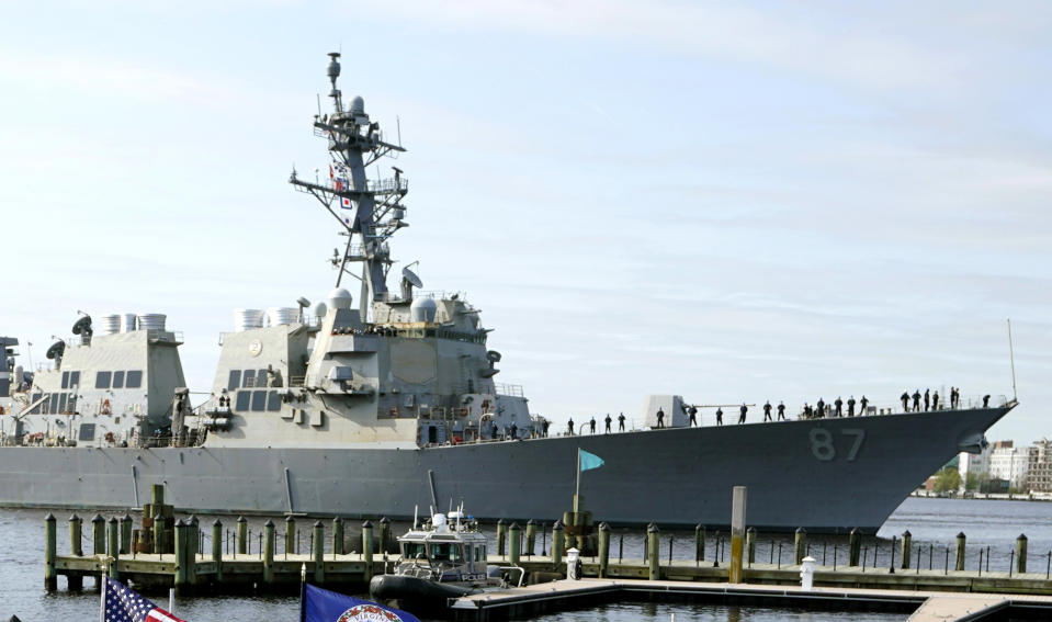 File - The USS Mason, an Arleigh Burke-class destroyer, passes a dock in Norfolk, Va., April 8, 2021. Officials said the USS Mason shot down a suspected Houthi drone flying in its direction during an incident in which two missiles fired from territory held by Yemen's Houthi rebels missed a commercial tanker loaded with jet fuel near the key Bab el-Mandeb Strait on Wednesday. (AP Photo/Steve Helber)