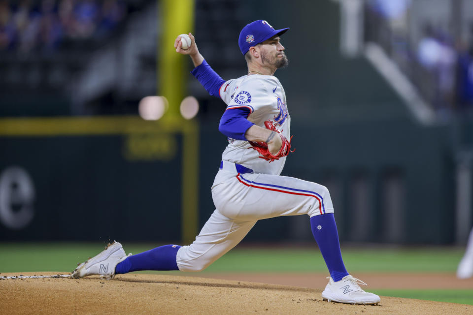 Texas Rangers starting pitcher Andrew Heaney delivers during the first inning of a baseball game against the Washington Nationals in Arlington, Texas, Wednesday, May 1, 2024. (AP Photo/Gareth Patterson)