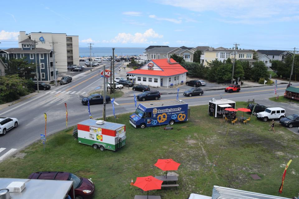The grassy land in the foreground, where the food trucks operate, is 203 E. Savannah Rd., co-owned by Rick Quill and Joe and Carla Johnson. It's one of Lewes's most prime pieces of undeveloped real estate.
