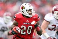 Jeremy Wright #28 of the Louisville Cardinals runs with the ball during the game against the Temple Owls at Papa John's Cardinal Stadium on November 3, 2012 in Louisville, Kentucky. (Photo by Andy Lyons/Getty Images)