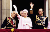 The Queen and Prince Philip waving to the crowds during her Silver Jubilee celebrations in 1977. The jubilee marked her 25th anniversary from acceding to the throne, and included a tour of countries around the world.