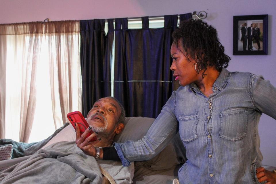 Demetrice Owens, Currie's nurse, talks to Currie on Dec. 5.