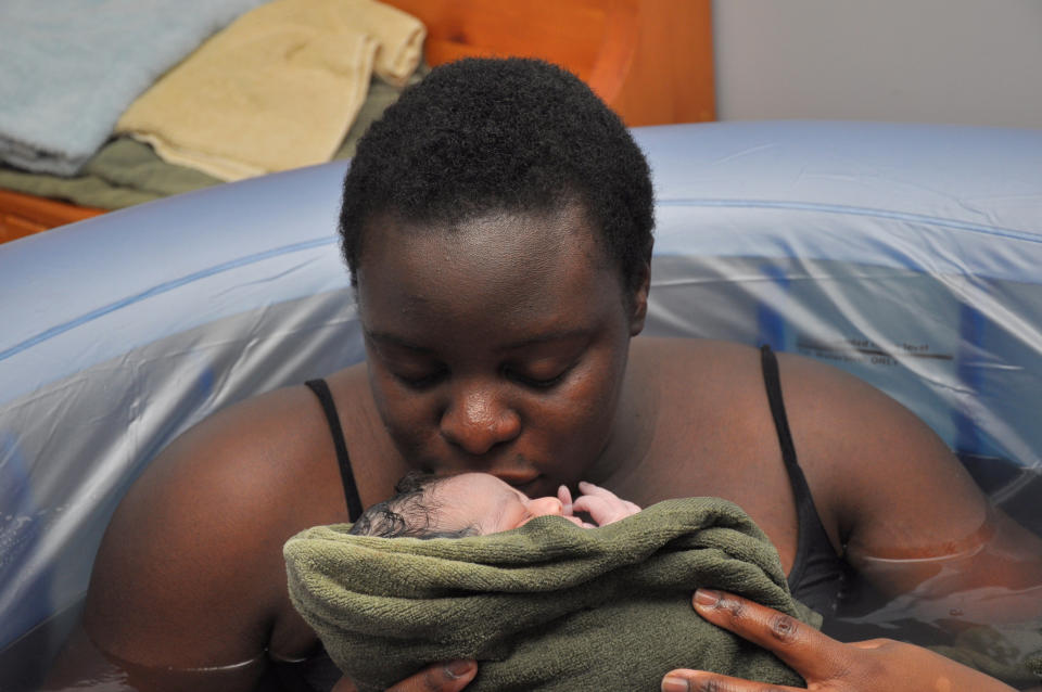 Woman having water birth. (Getty Images)