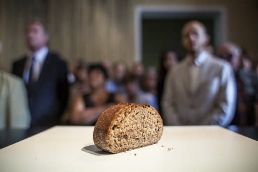 A piece of bread, the equivalent of a daily food ration in the Warsaw Ghetto during Nazi occupation, is presented as a part of an exhibition. Poland on Sunday marked the 70th anniversary of the start of Nazi Germany's mass deportation of Jews from the Warsaw ghetto to the death camp of Treblinka, one of the darkest episodes of the Holocaust