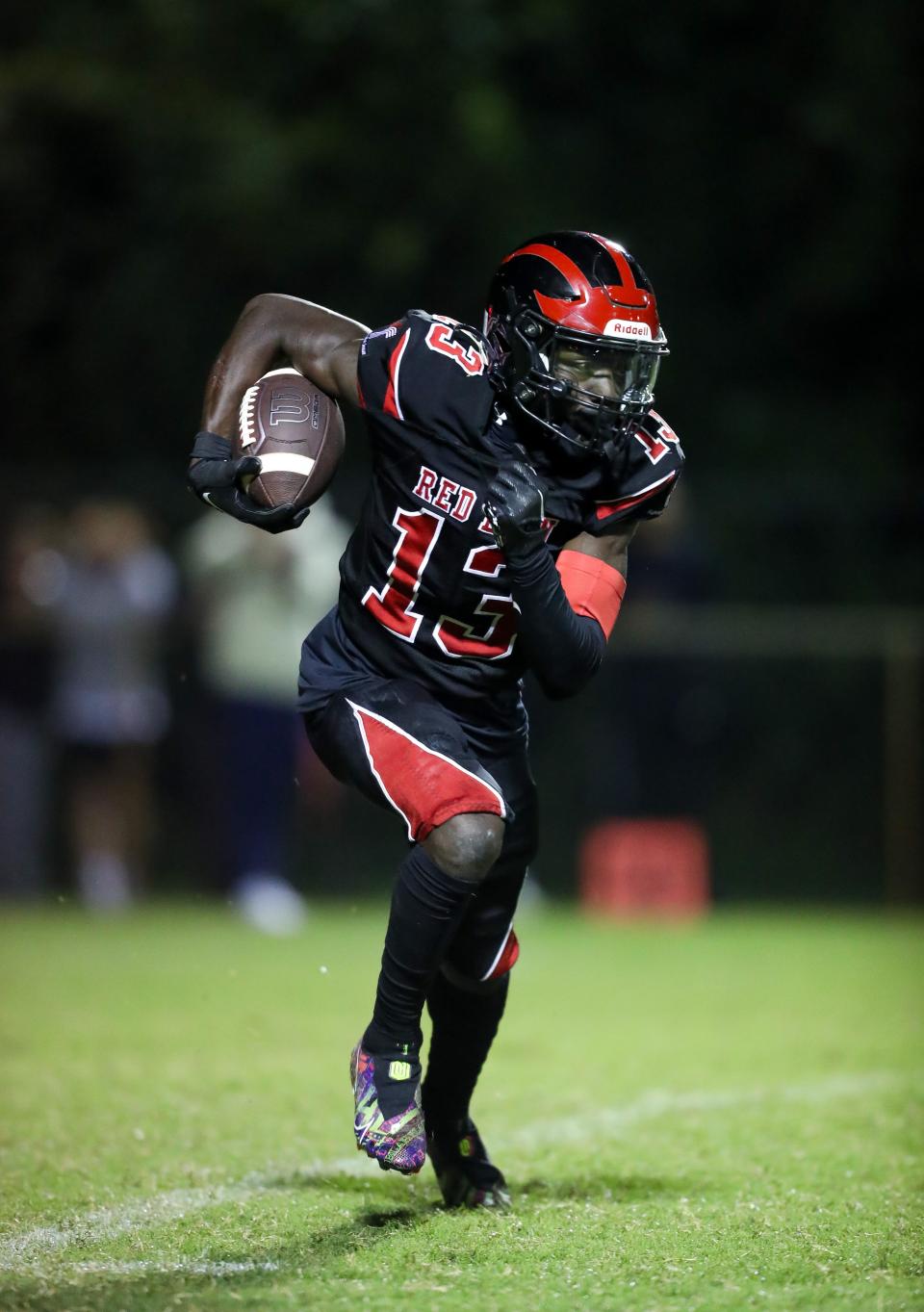 Red Lion Christian’s Jahsiear Rogers sprints during the Spartans’ 29-0 win over the Lions, Thursday, Sept. 21, 2023.