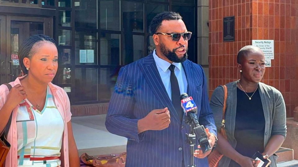 Family attorney Lee Merritt (center) spoke with the media after meeting with prosecutor Zachary Thompson. To his left is Ralph Yarl’s mom, Cleo Nagbe and his aunt, Faith Spoonmore.