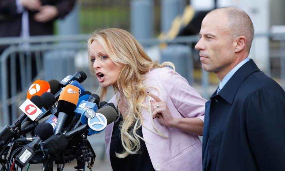 Stormy Daniels speaks outside US federal court in Manhattan with her lawyer Michael Avenatti.