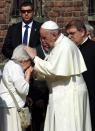 Pope Francis blesses a former woman inmate of the Auschwitz concentration camp during a visit to the camp Auschwitz I in Oswiecim, Poland, 29 July 2016. Pope Francis visits the site of former Nazi German concentration camp Auschwitz II - Birkenau, as part of his visit to Poland. (EPA/RADEK PIETRUSZKA POLAND OUT)