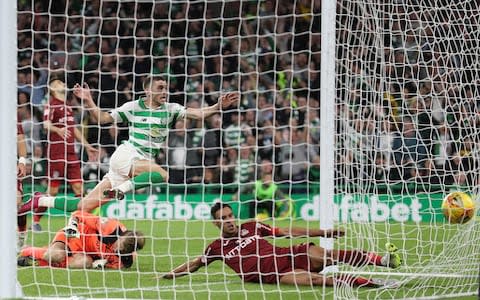 Ryan Christie of Celtic scores his team's third goal during the UEFA Champions League, third qualifying round - Credit: Ian MacNicol/Getty Images