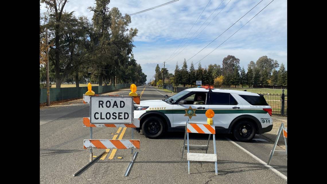 Deputies shot a man who they say fired at law enforcement during a standoff near Belmont and Wintergreen avenues on Tuesday, Dec. 6, 2022, according to the Fresno County Sheriff’s Office. THADDEUS MILLER/tmiller@fresnobee.com