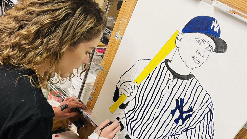 Brittney Palmer works on her drawing of Alex Rodriguez for a special edition Topps baseball card.  (Photo courtesy Brittney Palmer)