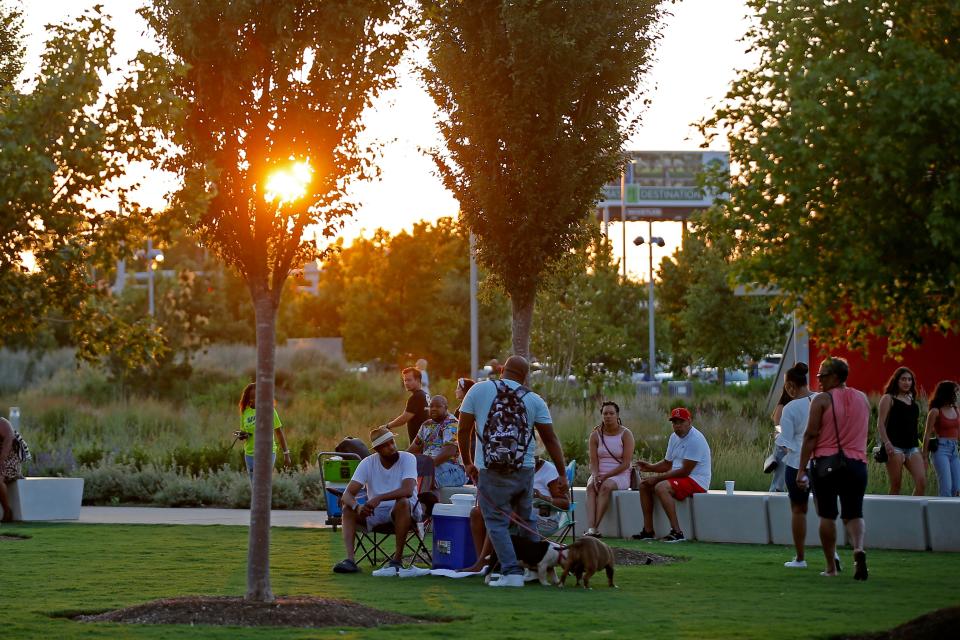 People listen to music during Scissortail Park's 2022 Summer of Soul Night at Love's Travel Stops Stage and Great Lawn in Oklahoma City.