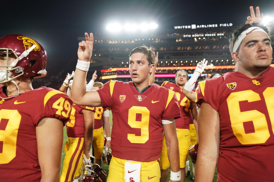 USC quarterback Kedon Slovis (9) gestures with a "Fight On" sign after the Trojans' win over Fresno State. (USAT)