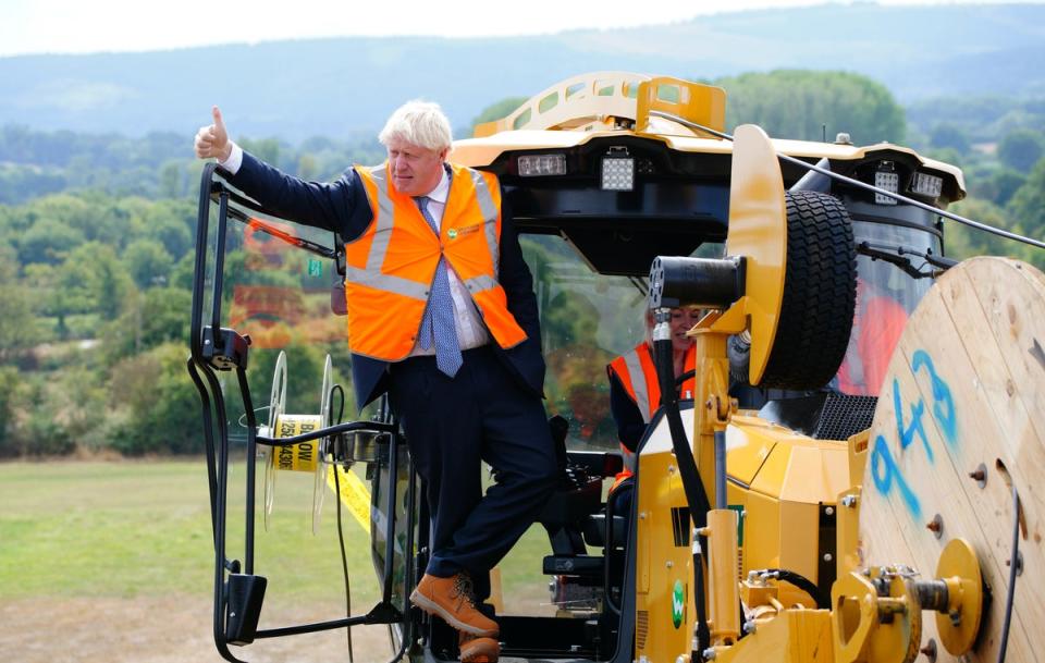 Prime Minister Boris Johnson during a visit to Henbury Farm in north Dorset, where Wessex Internet are laying fibre optics in the field (Ben Birchall/PA) (PA Wire)