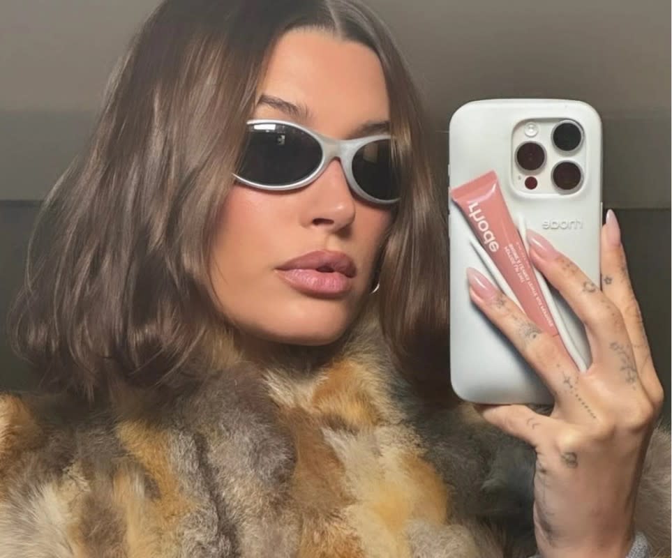 Hailey Bieber with the <a href="https://rstyle.me/+QFlSHKtqJlSMO1_p6RVh4g" rel="nofollow noopener" target="_blank" data-ylk="slk:Rhode Lip Case;elm:context_link;itc:0;sec:content-canvas" class="link ">Rhode Lip Case</a><p>Photo: Courtesy of Rhode</p>