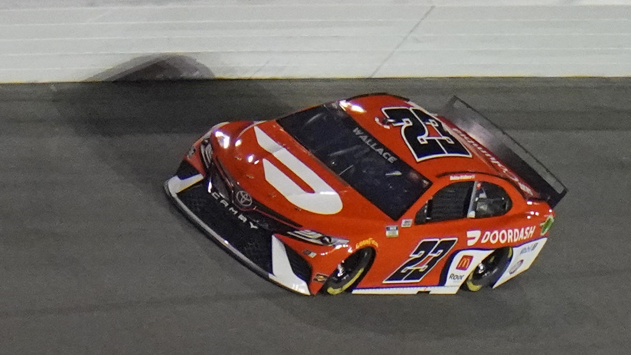 Bubba Wallace runs during a NASCAR Daytona 500 qualifying session Wednesday, Feb. 10, 2021, at Daytona International Speedway in Daytona Beach, Fla. (AP Photo/Chris O'Meara)