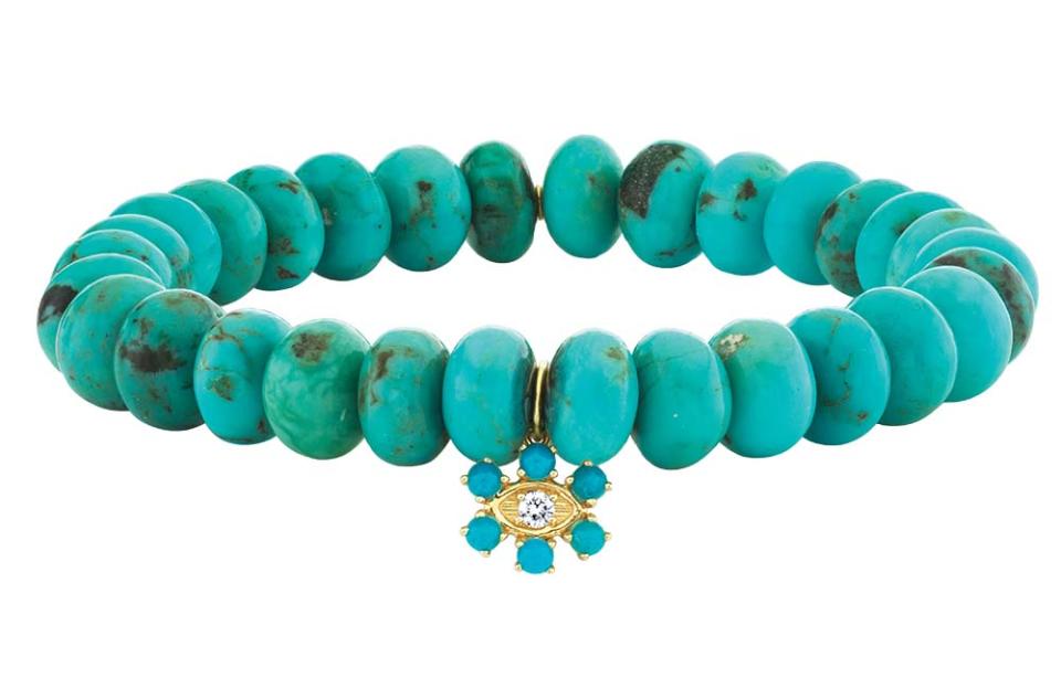 This Marquise Eye Flower Bracelet features turquoise beads and diamonds set in 14-karat yellow gold; $1,005, at sydneyevan.com