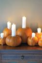 <p>Feeling spooked? Brighten your space with these classy pumpkins outfitted with drip pillar candles.</p><p>Get the <a href="https://www.womansday.com/home/crafts-projects/how-to/a5950/halloween-craft-how-to-candle-pumpkins-123346/" rel="nofollow noopener" target="_blank" data-ylk="slk:Night Light Pumpkins tutorial;elm:context_link;itc:0;sec:content-canvas" class="link "><strong>Night Light Pumpkins tutorial</strong></a>.</p><p><a class="link " href="https://www.amazon.com/Royal-Imports-Candles-Birthday-Decoration/dp/B07RM5TZLM?tag=syn-yahoo-20&ascsubtag=%5Bartid%7C10070.g.331%5Bsrc%7Cyahoo-us" rel="nofollow noopener" target="_blank" data-ylk="slk:SHOP PILLAR CANDLES;elm:context_link;itc:0;sec:content-canvas">SHOP PILLAR CANDLES</a></p>