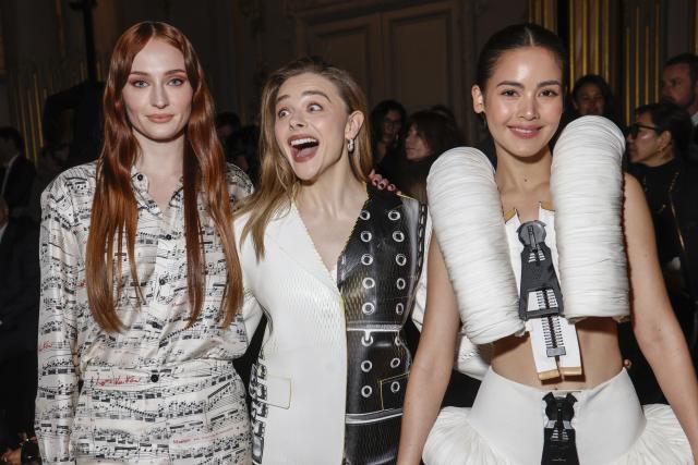 Chloe Grace Moretz and designer Nicolas Ghesquiere pose for photographers  following the Louis Vuitton Fall/Winter 2023-2024 ready-to-wear collection  presented Monday, March 6, 2023 in Paris. (Vianney Le Caer/Invision/AP  Stock Photo - Alamy