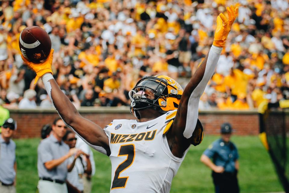 Missouri cornerback Ennis Rakestraw (2) celebrates after his first-career interception during the Tigers' 34-17 win over Abilene Christian on Sept. 17, 2022.