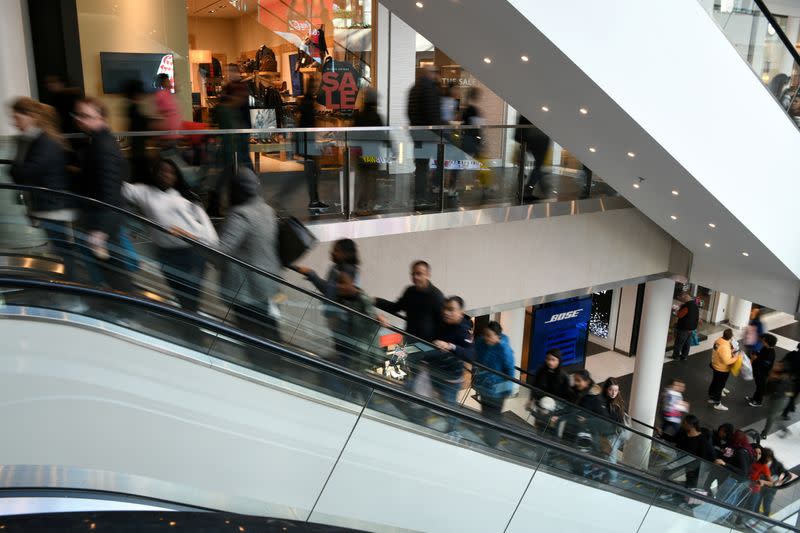 FILE PHOTO: Holiday shoppers look for deals at the Pentagon City Mall in Arlington