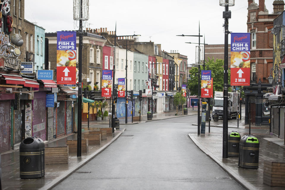 A general view of a deserted Camden High Street, as the UK continues its lockdown to help curb the spread of coronavirus, in London, Wednesday April 29, 2020. (Dominic Lipinski/PA via AP)