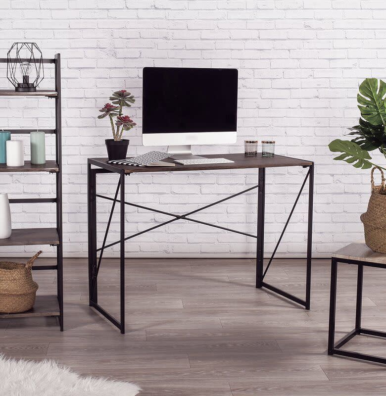 <p><a href="https://go.redirectingat.com?id=74968X1596630&url=https%3A%2F%2Fwww.wayfair.com%2Ffurniture%2Fpdp%2Fsand-stable-kaelin-desk-w004745960.html&sref=https%3A%2F%2Fwww.esquire.com%2Flifestyle%2Fg33806651%2Fbest-work-from-home-desks%2F" rel="nofollow noopener" target="_blank" data-ylk="slk:Shop Now;elm:context_link;itc:0;sec:content-canvas" class="link rapid-noclick-resp">Shop Now</a></p><p>Kaelin Desk</p><p>wayfair.com</p><p>$76.99</p>