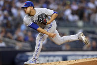 Toronto Blue Jays pitcher Jose Berrios throws during the first inning of the team's baseball game against the New York Yankees on Thursday, Aug. 18, 2022, in New York. (AP Photo/Adam Hunger)