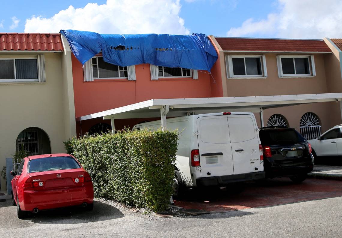 This is the sight no Florida homeowner ever wants to see. A tarp covers a leaky roof in Hialeah on Thursday, Oct. 6, 2020.