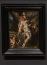 Bartholomeus Spanger's "Body of Christ Supported by Angels" oil on copper painting, which went on display at the Rijksmuseum in Amsterdam, Netherlands, Monday, June 1, 2020. The cultural institution received the gift of the major painting to underscore support for the victims of the coronavirus pandemic and the crisis that museums face world wide. The Dutch government took a major step to relax the coronavirus lockdown, with bars, restaurants, cinemas and museums reopening under strict conditions. (AP Photo/Peter Dejong)