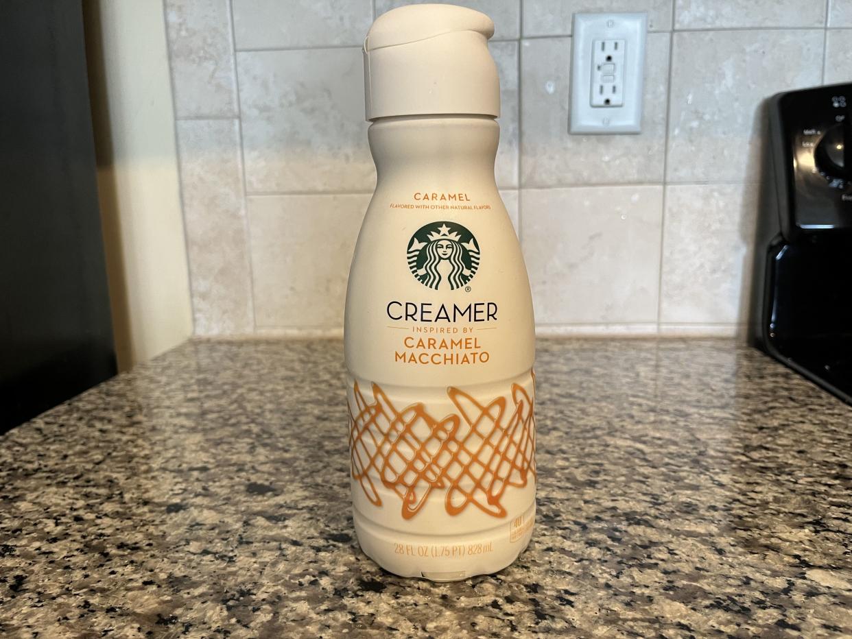a bottle of starbucks caramel macchiato coffee creamer