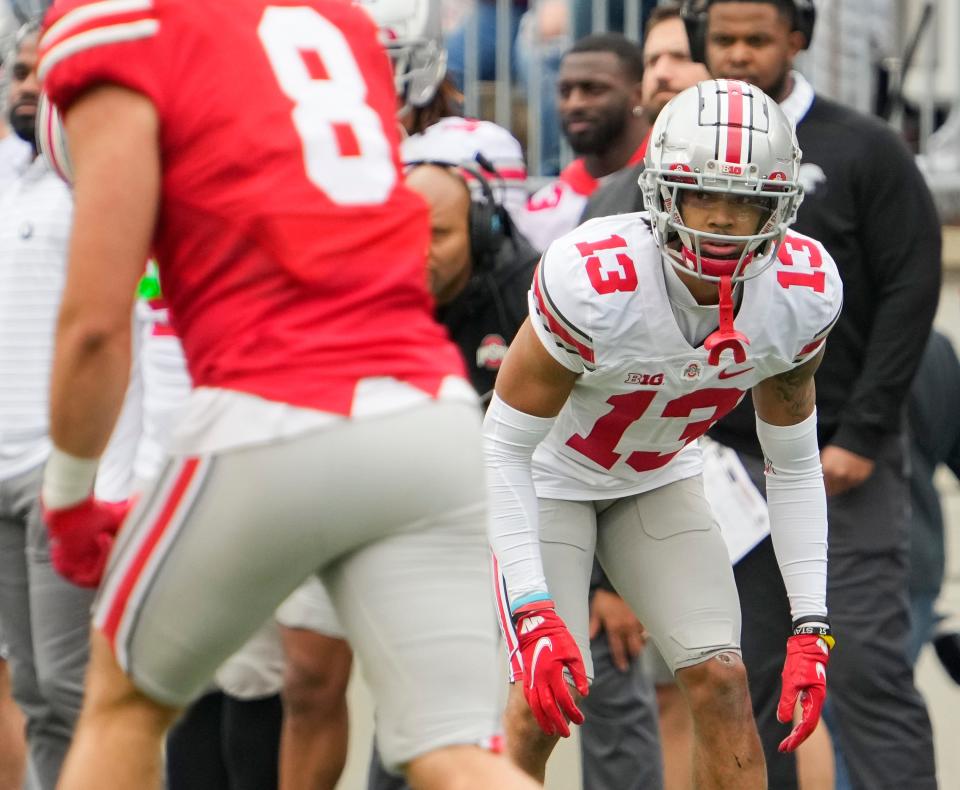 Ohio State Buckeyes cornerback Jordan Hancock (13) lines up during the spring football game at Ohio Stadium in Columbus on April 16, 2022.