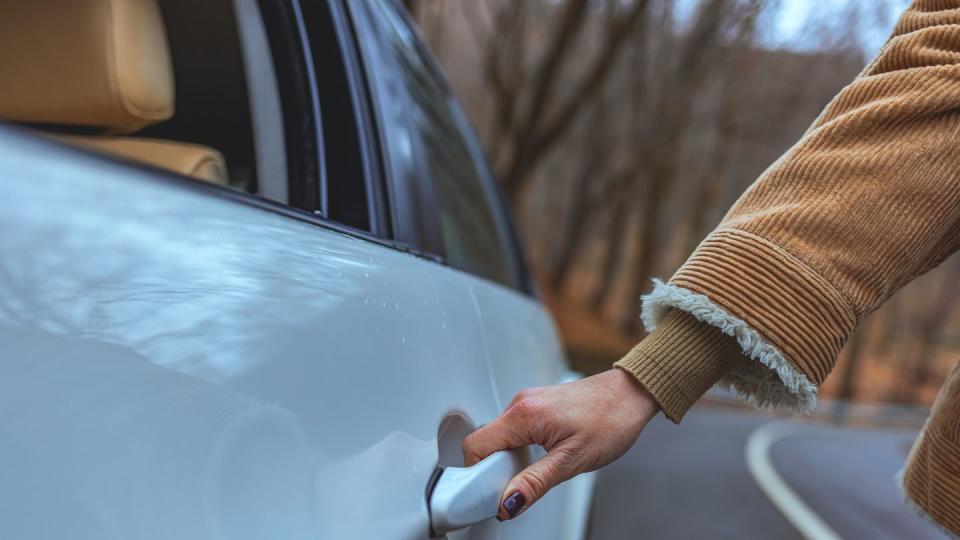 opening car door after signing lease