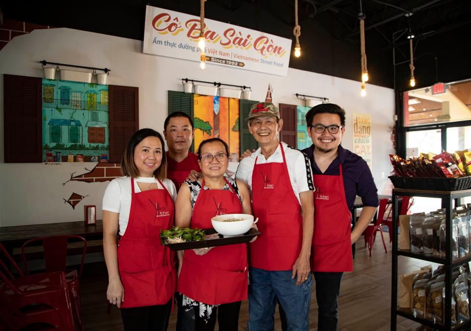 Family portrait at Yen's Kitchen, from left: Thanh Phuong Trac, Mike Du, Yen Nguyen, Hung Trac and Manh Trac. The Vietnamese restaurant opened in the summer of 2020 on Lake Worth Road.