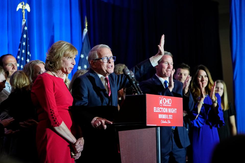 After being reelected, Gov. Mike DeWine speaks alongside his wife, Fran, during an election night party for Republican candidates for statewide offices at the Renaissance Hotel in downtown Columbus.