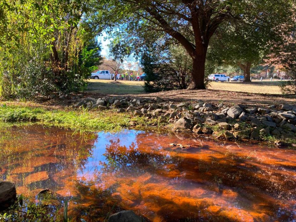 This creek in Columbia’s Memorial Park turned red after a diesel fuel spill Dec. 5, 2021.