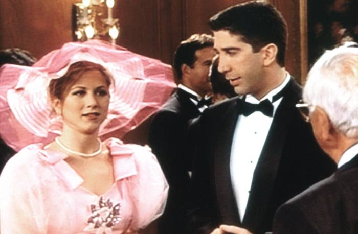 Screenshot of Rachel in a ugly pink bridesmaid dress