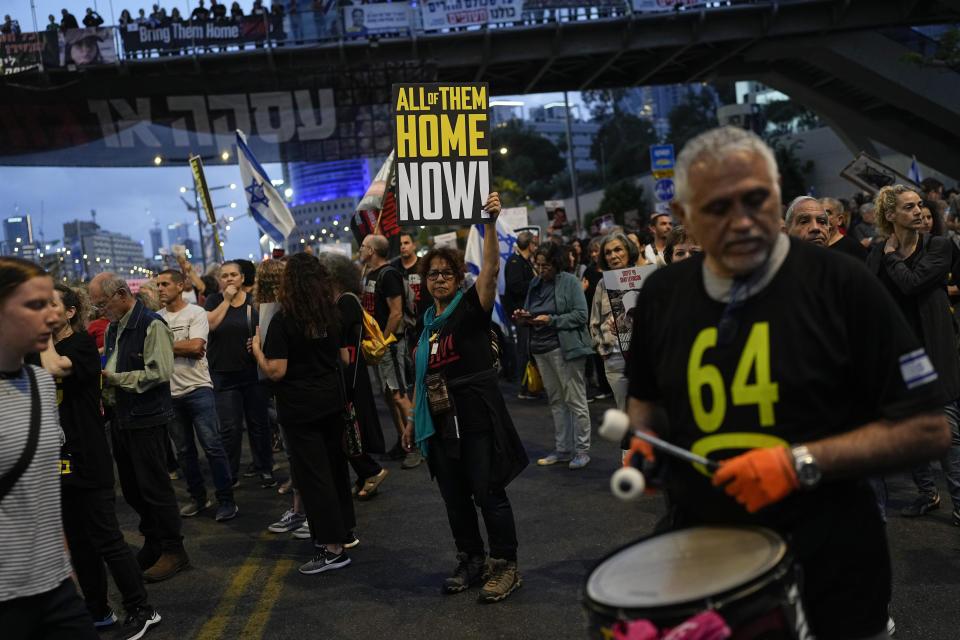 Relatives and supporters of the Israeli hostages held in the Gaza Strip by the Hamas militant group call for their release during a protest in Tel Aviv, Monday, April 29, 2024. (AP Photo/Ohad Zwigenberg)