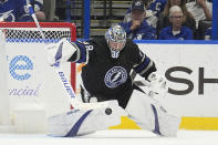 Tampa Bay Lightning goaltender Andrei Vasilevskiy (88) makes a save on a shot by the New York Islanders during the second period of an NHL hockey game Saturday, March 30, 2024, in Tampa, Fla. (AP Photo/Chris O'Meara)