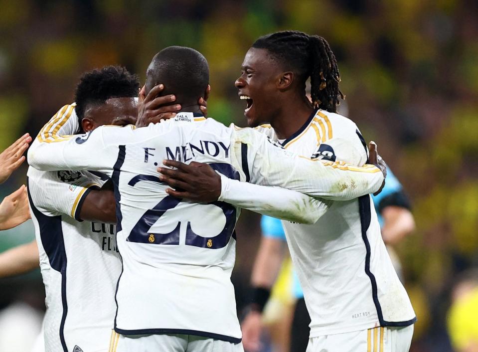 Eduardo Camavinga, right, celebrates with his teammates (Reuters)