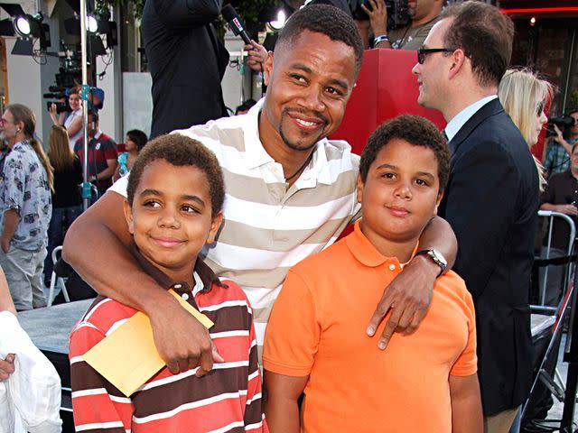 <p>SGranitz/WireImage</p> Cuba Gooding Jr. and kids Spencer and Mason during the world premiere of "Superman Returns".
