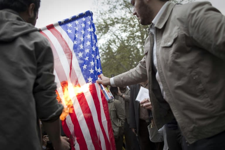 Iranian students burn a US flag during a 2011 protest in Tehran