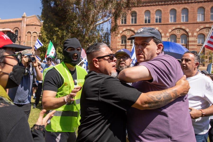 LOS ANGELES, CALIFORNIA – APRIL 28: Tension rises between Pro-Palestinian and pro-Israeli protestors on the campus of the University of California Los Angeles (UCLA) on April 28, 2024 in Los Angeles, California. (Photo by Grace Hie Yoon/Anadolu via Getty Images)