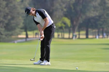 Mar 5, 2017; Mexico City, MEX; Tommy Fleetwood putts on the 14th green during the final round of the WGC - Mexico Championship golf tournament at Club de Golf Chapultepec. Mandatory Credit: Orlando Ramirez-USA TODAY Sports