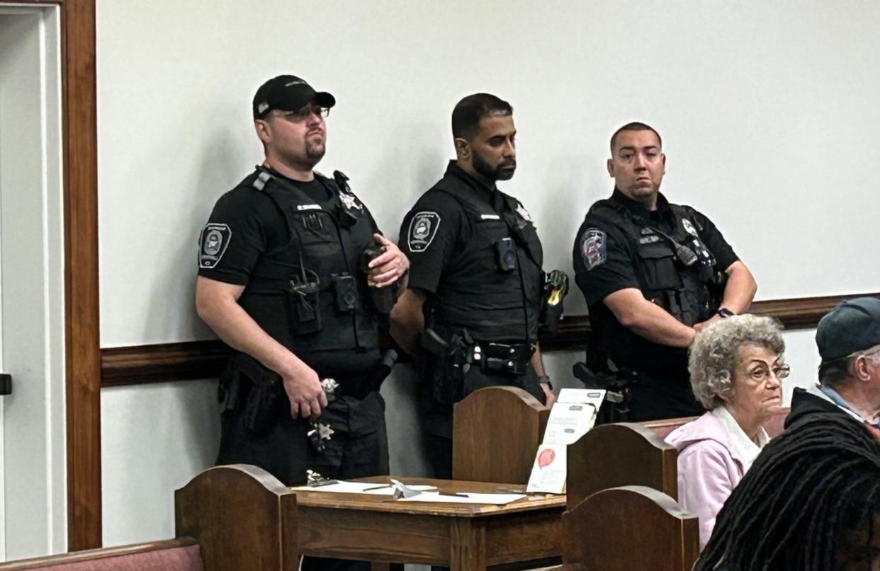 Some Hopewell Police officers listen to a public hearing on collective bargaining Tuesday, Oct. 10, 2023, in Hopewell. The city is considering a proposal to bring collective bargaining to town as a way to recruit and retain law-enforcement personnel, and not lose them to higher wages in other departments.