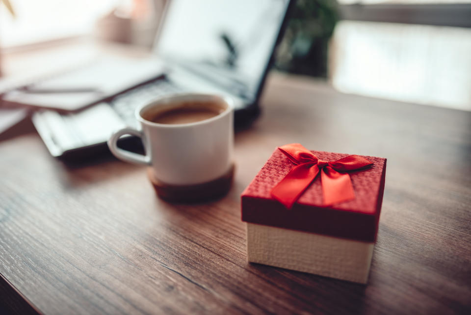 Red gift box on the office desk